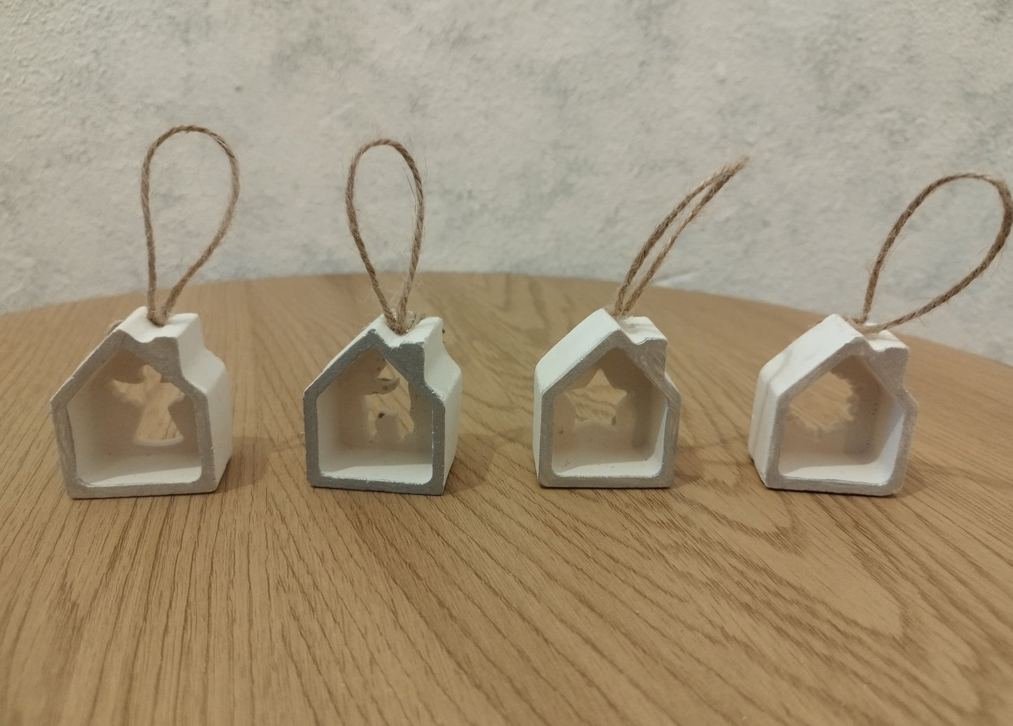 Small Christmas ornaments on a wooden table