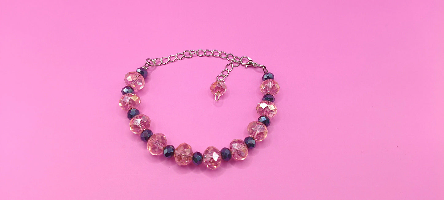 Βραχιόλι με μαύρες και ρώζ χάντρες