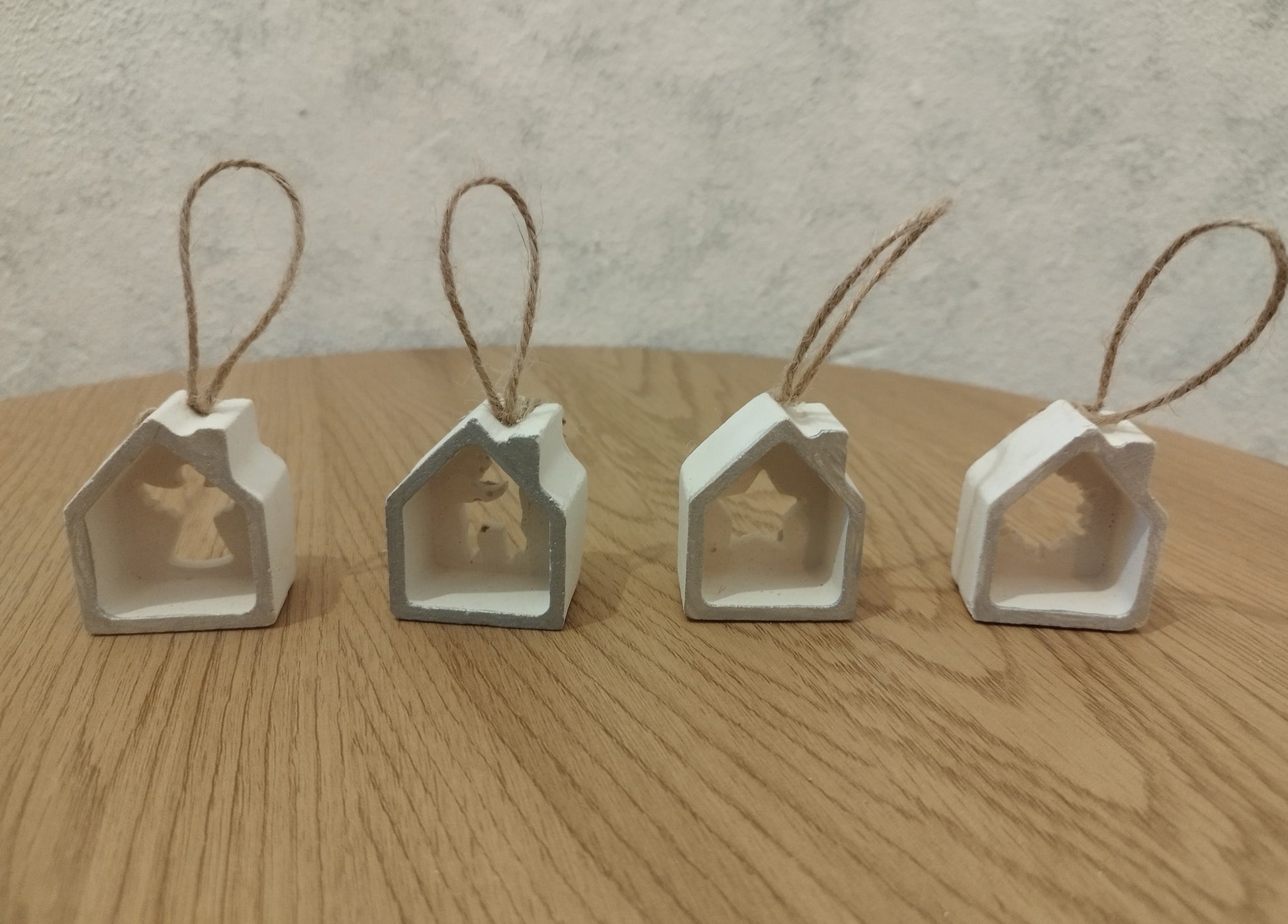 Small Christmas ornaments on a wooden table