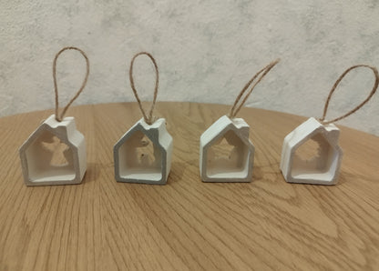 Small Christmas ornaments on a wooden table