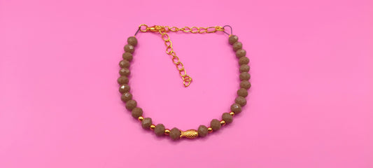 Βραχιόλι με γκρι χάντρες και ατσάλινο χρυσό ψαράκι