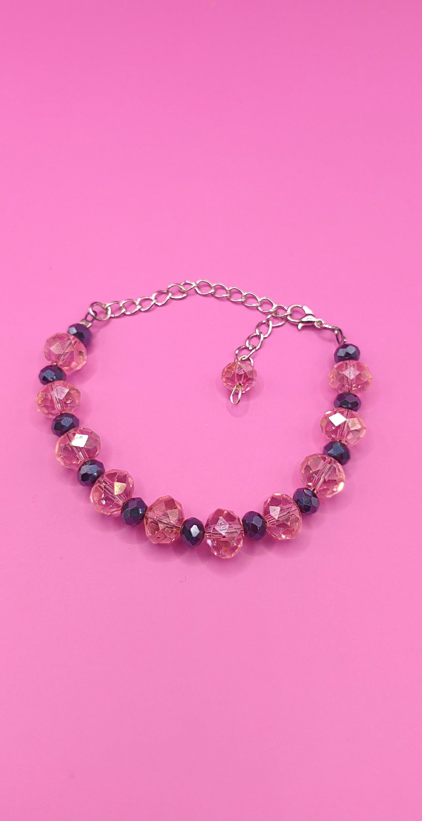 Βραχιόλι με μαύρες και ρώζ χάντρες