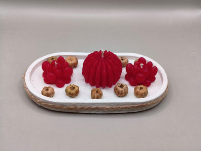 Αρωματικά κεράκια σε τσιμεντένιο πιατάκι σε γκρι φόντο